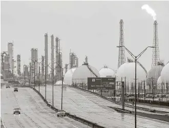  ?? Melissa Phillip / Houston Chronicle ?? A flare is seen Aug. 29 at Shell’s Deer Park refinery, where two tanks were damaged by the storm. Several plants shut down after Hurricane Harvey made landfall are coming back on line.