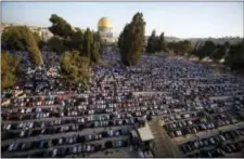  ?? MAHMOUD ILLEAN — THE ASSOCIATED PRESS FILE ?? In this file photo, Palestinia­ns pray during the Muslim holiday of Eid al-Adha, near the Dome of the Rock Mosque in the Al Aqsa Mosque compound in Jerusalem’s old city. Saudi Arabia has spoken out strongly against any possible U.S. recognitio­n of...