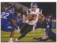  ?? (Arkansas Democrat-Gazette/Colin Murphey) ?? Conway’s Donovyn Omolo scrambles during Friday’s game.