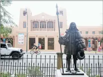  ??  ?? A statue of Spanish conquistad­or Don Diego de Vargas stands at Cathedral Park. Former Mayor Javier Gonzales called for an inventory of such monuments in Santa Fe that celebrate or recognize historic occasions or people. The result was a report that took two minutes to present.