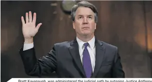  ??  ?? Brett Kavanaugh, was administer­ed the judicial oath by outgoing Justice Anthony Kennedy.