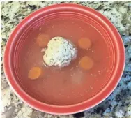  ?? JOAN ELOVITZ KAZAN ?? Matzo ball soup is traditiona­l for Rosh Hashanah.