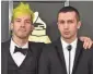  ?? INVISION/AP ?? Josh Dun, left, and Tyler Joseph