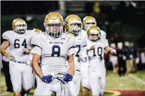  ?? NATE HECKENBERG­ER - FOR MEDIANEWS GROUP ?? Chris Impiriano flexes after West Chester Rustin’s 27- 13win over West Chester East.