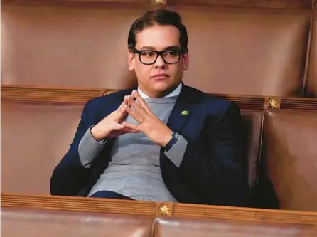  ?? ALEX BRANDON/AP ?? Rep. George Santos, R-N.Y., waits for the start of a session in the House chamber as the House meets for the fourth day to elect a speaker and convene the 118th Congress in Washington, D.C., on Jan. 6.