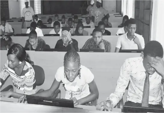  ??  ?? Some Post Unified Matriculat­ion Examinatio­n Candidates, writing the Exams at Landmark University, Omu-Aran, Irepodun Local Government Area of Kwara yesterday. Pic: NAN