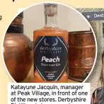  ??  ?? Katayune Jacquin, manager at Peak Village, in front of one of the new stores. Derbyshire Distillery is to open a shop there next month