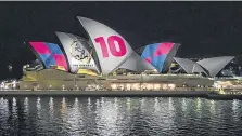  ??  ?? Sydney Opera House lit up with the controvers­ial branding