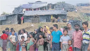  ?? AFP ?? Rohingyas arrive at Balukhali refugee camp in the Bangladesh­i town of Ukhiya on Wednesday.