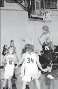  ?? MARK HUMPHREY ENTERPRISE-LEADER ?? Prairie Grove 2018 graduate, Sarah James Stone, shown making an athletic move to score a twisting layup against West Fork, is the Enterprise-Leader’s Female Athlete of the Year for school year 2017-2018 at Prairie Grove.