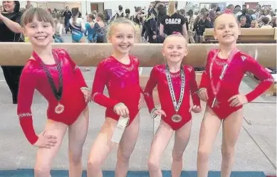  ??  ?? All smiles Hamilton Gymnastics club were delighted with the performanc­es of their athletes