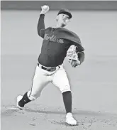  ?? SAM NAVARRO/USA TODAY SPORTS ?? Marlins starting pitcher Jordan Yamamoto delivers a pitch against the Nationals.