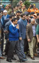  ?? — PTI, PRITAM BANDYOPADH­YAY, AFP ?? Delhi chief minister Arvind Kejriwal ( clockwise from top left) arrives at Karol Bagh’s Hotel Arpit Palace on Tuesday; firefighte­rs and police officials in front of the hotel; the body of a hotel staff who died in the fire at Lady Hardinge Hospital; a grieving relative of a victim near an ambulance at a hospital.