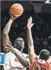  ?? HOLLY HART/AP ?? Illinois’ Kofi Cockburn puts up a shot in an exhibition game against Lewis on Nov. 1 in Champaign.