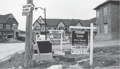  ?? TYLER ANDERSON / NATIONAL POST FILES ?? The average detached home price in the GTA is now just a little over $1 million, down from $1,205,262 in April.
