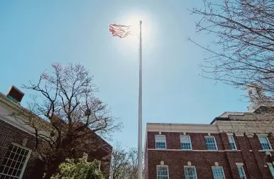  ?? Christian Abraham/Hearst Connecticu­t Media ?? A view of the flagpole outside of New Canaan Town Hall on Tuesday. The New Canaan Board of Selectmen has approved a policy regulating which flags can be flown on town property.