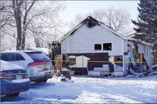  ?? CP PHOTO HEYWOOD YU ?? The scene of a house fire that happened Sunday on Ottawa Street in Davidson, Sask., on Monday. The fire claimed the lives of five people, including three children.