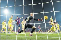  ?? Picture: REUTERS ?? Villarreal’s Eric Bailly scores an own goal and FC Barcelona’s third during their LaLiga match at the Estadi Olimpic Lluis Companys in Barcelona, Spain.
