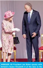  ??  ?? WINDSOR: US President Joe Biden speaks with Britain’s Queen Elizabeth II at the dais in the Quadrangle of Windsor Castle yesterday. — AFP