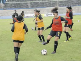  ?? (Photo: Joseph Wellington) ?? Reggae Girlz midfielder Marlo Sweatman about to make a pass during a training session at the National Stadium yesterday.