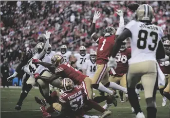  ?? AP PHOTO/GODOFREDO A. VÁSQUEZ ?? San Francisco 49ers cornerback Jimmie Ward (1) reaches for a fumble by New Orleans Saints running back Alvin Kamara (41) during the second half of an NFL football game in Santa Clara, Calif., on Sunday.