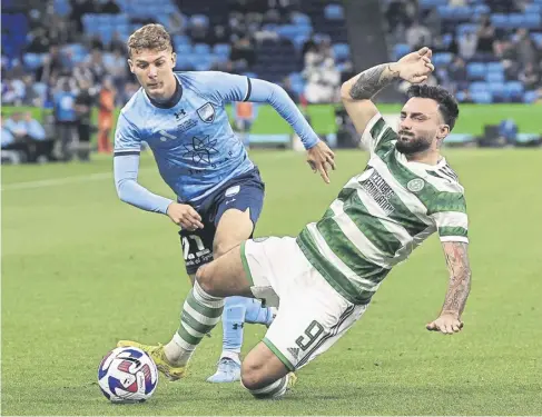  ?? ?? ↑ Sead Haksabanov­ic is chased down by Alex Parsons during Celtic’s 2-1 defeat by Sydney FC at Allianz Stadium yesterday