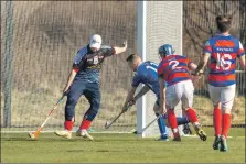  ?? Photograph: Neil Paterson. ?? Kingussie keeper Rory MacGregor and Robert Mabon deal with a ball from Daniel Stewart, Kilmallie.