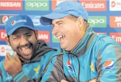  ?? AP ?? Pakistan coach Mickey Arthur, right, with captain Sarfraz Ahmed.