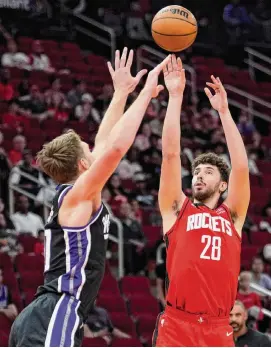  ?? Brett Coomer/Staff photograph­er ?? Even after outplaying All-Star Domantas Sabonis, Alperen Şengün (28) wanted to talk about how the Rockets are “playing like animals” on defense.