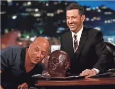  ??  ?? Kimmel will have more on his mind for the Oscars Feb. 26 than he did with guest Vin Diesel and his gummy likeness.