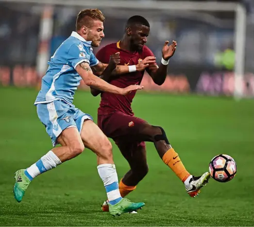  ?? — AFP ?? Flexible player: Germany’s Antonio Rudiger (right) joined AS Roma from Stuttgart in 2015 and can be used as a centreback and fullback.