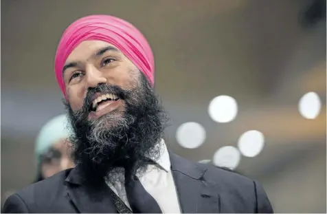  ?? CHRIS YOUNG/THE CANADIAN PRESS ?? Jagmeet Singh listens to a speech before the announceme­nt he won the first ballot in the NDP leadership race on Oct. 1. Singh launched an introducto­ry tour Sunday that is expected to take the party’s new leader into every province and territory before...