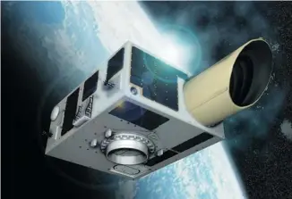  ??  ?? Scheduled for launch Monday on a rocket in India, the NEOSSat satellite is the size and shape of a large suitcase, with a tube-shape telescope sticking out one end.