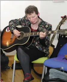  ??  ?? Songwriter Helen Grehan sings one of her songs at Ballymote Culture Night in Ballymote Library ( Photo; Tom Callanan )