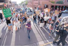  ?? EDDIE MOORE/JOURNAL ?? Hundreds march in Santa Fe during a June 3 protest demanding an end to police brutality and systemic racism.