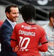  ?? (Photo AFP) ?? Julien Stéphan et sa pépite Eduardo Camavinga visent la tête de la L ce soir.