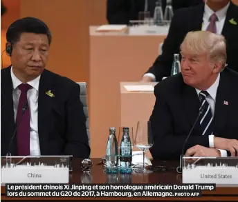  ?? PHOTO AFP ?? Le président chinois Xi Jinping et son homologue américain Donald Trump lors du sommet du G20 de 2017, à Hambourg, en Allemagne.