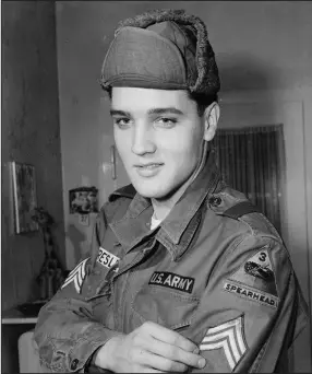  ?? (AP Photo) ?? Corporal Elvis Presley is seen in this Jan. 21, 1960, file photo taken in Bad Nauheim while serving for the U.S. Army in Germany.