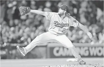  ?? DENNIS WIERZBICKI, USA TODAY SPORTS ?? Clayton Kershaw will get the opening game start Tuesday for the Dodgers in the franchise’s first trip to the World Series since 1988.