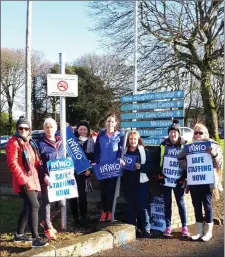  ??  ?? Nurses on strike outside New Haughton Hospital.