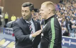  ??  ?? 0 Pedro Caixinha, left, offers Neil Lennon a friendly handshake.