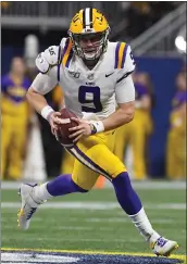  ?? JOHN AMIS — THE ASSOCIATED PRESS ?? LSU quarterbac­k Joe Burrow (9) was one of a record 15 players from the SEC drafted in the first round.