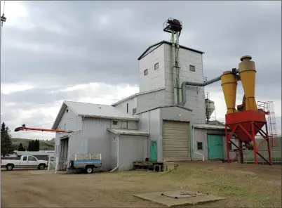  ?? NEWS PHOTO COLLIN GALLANT ?? Operations of the 11-22 Seed Cleaning plant on Bridge Street could soon have a new location on Highway 41A in Cypress County after that council approved land zoning change for 18 acres east of the Hamlet of Veinervill­e this week. The cooperativ­e seed...