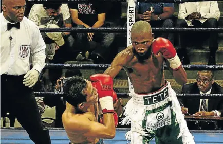  ?? /BAFANA MAHLANGU ?? Zolani Tete, right, throws a punch at Richard Garcia during a previous IBF flyweight fight at Nasrec in Johannesbu­rg. He fights Siboniso Gonya on Saturday.