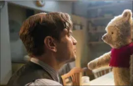  ?? LAURIE SPARHAM — DISNEY VIA AP, FILE ?? This image released by Disney shows Ewan McGregor in a scene from “Christophe­r Robin.” Tom Cruise has outrun Winnie-the-Pooh at the box office. “Mission: Impossible