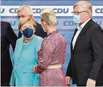  ?? ?? REFLEXIVOS. Merkel y Laschet luego de los resultados.