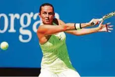  ?? AP ?? Roberta Vinci returns a shot to Anna-Lena Friedsam during their US Open match yesterday.