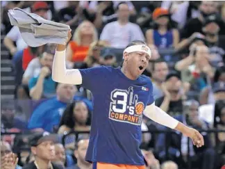  ?? Mike Stobe Getty Images ?? FORMER MVP Allen Iverson still isn’t talking about practice, but he’s clearly thrilled about being the player/coach for one of the teams in the Big3 league, which made its debut Sunday in New York.