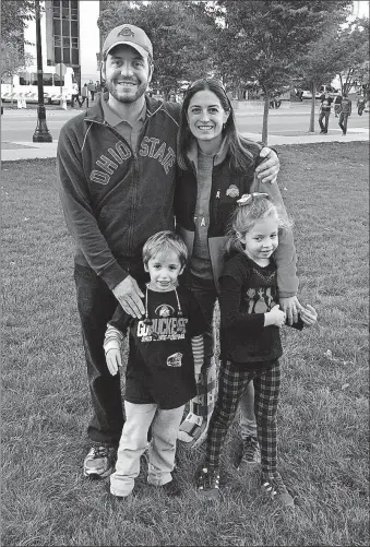 ?? [FAMILY PHOTO] ?? Zach Lawrence, seen here with his wife, Meghan, and their children, Donovan and Adrianne, remains critically injured in a hospital in Europe after a crash while he was on a business trip. His family is working to get him back to the United States.