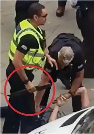  ??  ?? Held down: Police take the blade, circled